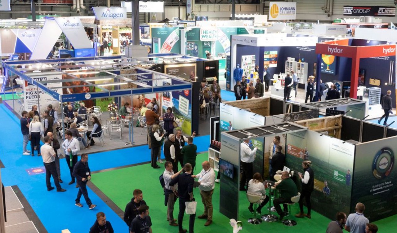 Overhead shot of people milling around an expo event.